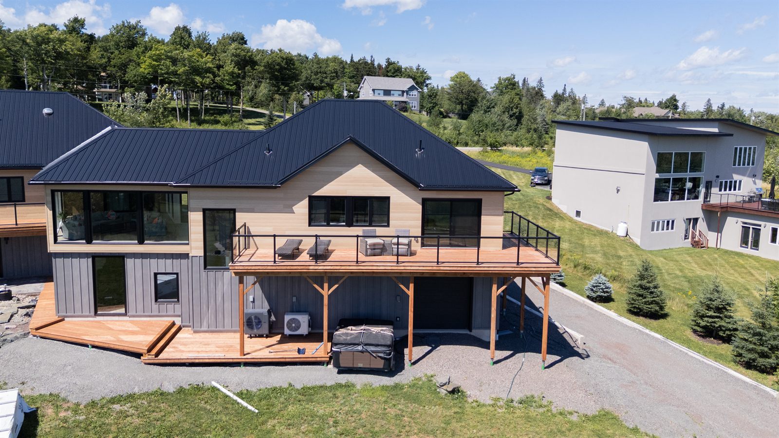 Finished Timberline home, rear deck aerial
