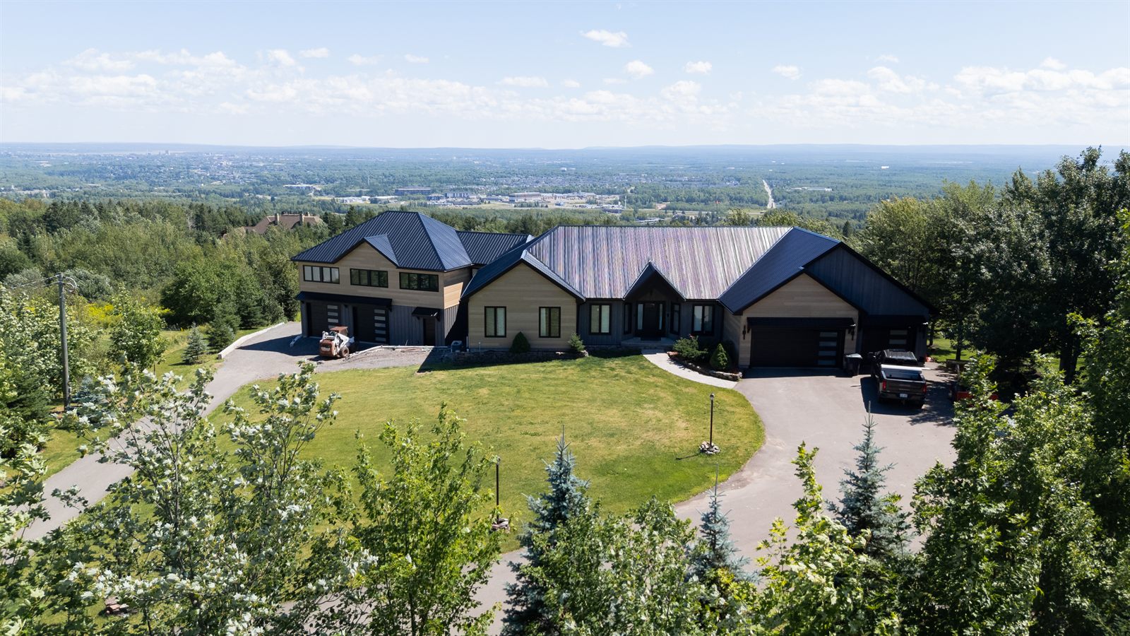 Finished Timberline home, aerial with valley view