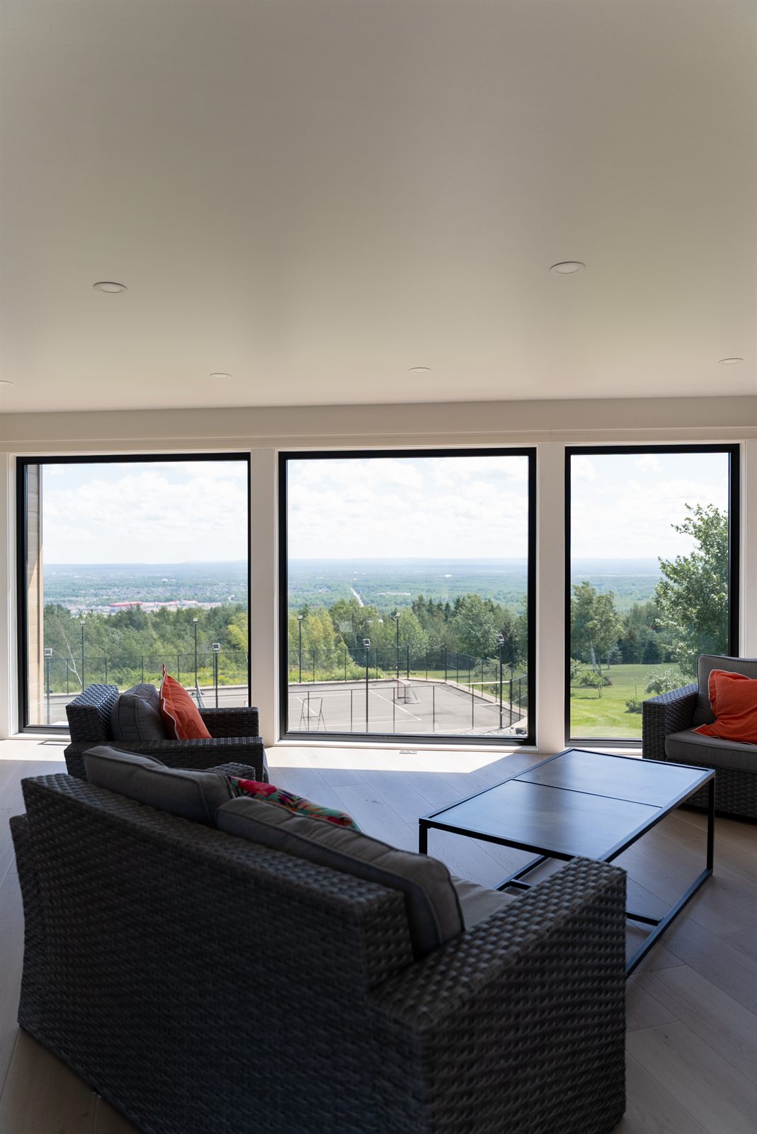 Finished Timberline living room with panoramic windows