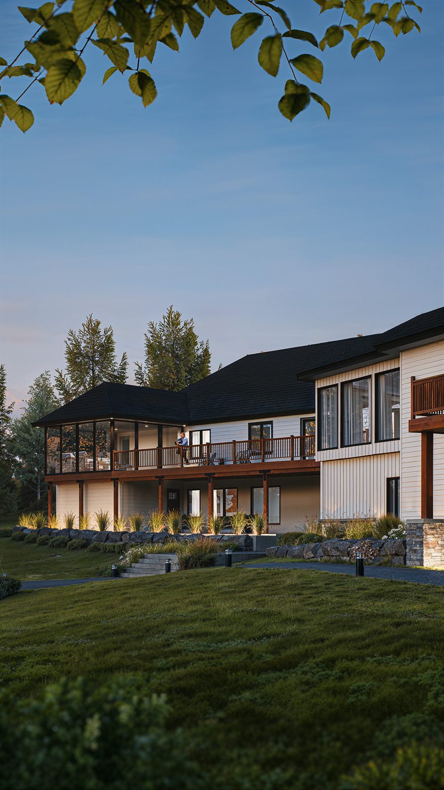 Modern custom home exterior at dusk